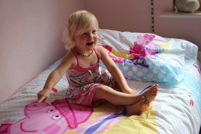 Sienna happy with her new Peppa Pig duvet set