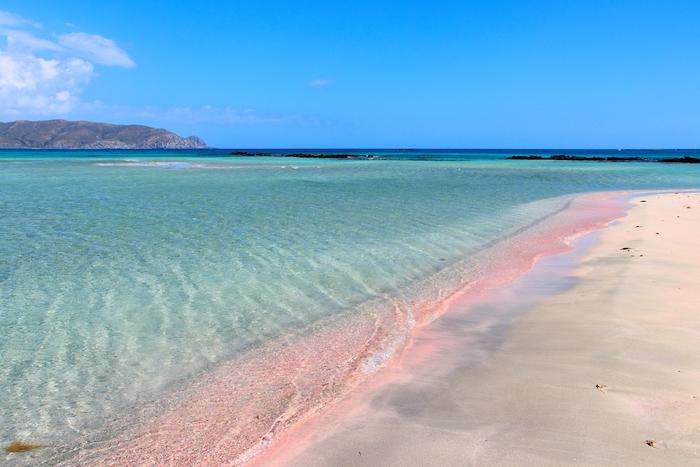 Coast of Crete island in Greece. Pink sand beach of famous Elafonisi (or Elafonissi).
