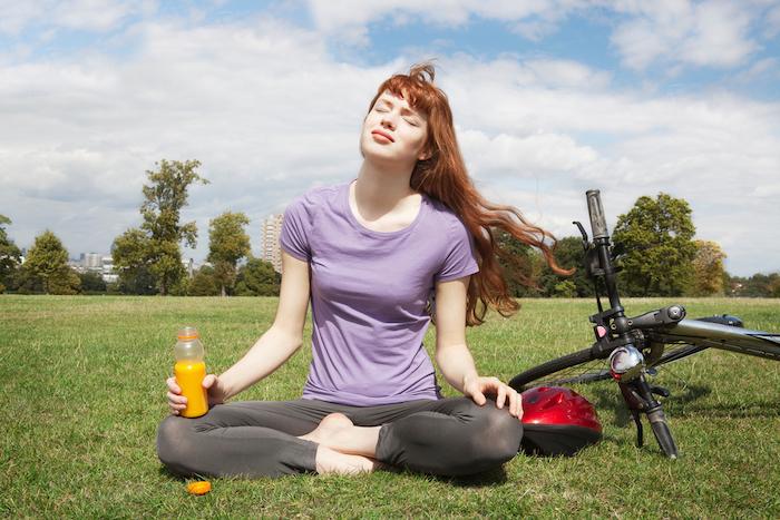 Young woman relaxing from bikeride