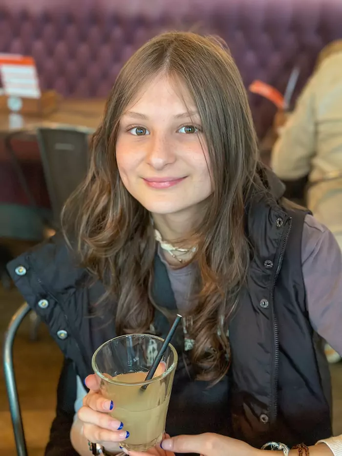 Bella drinking apple juice