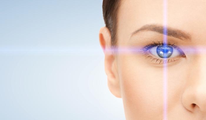 How to Look After Your Eye Health. picture of beautiful woman pointing to eye