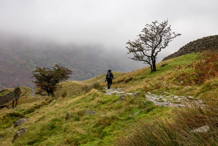 walker-in-the-lake-district-foggy-landscape-in-the-autumn