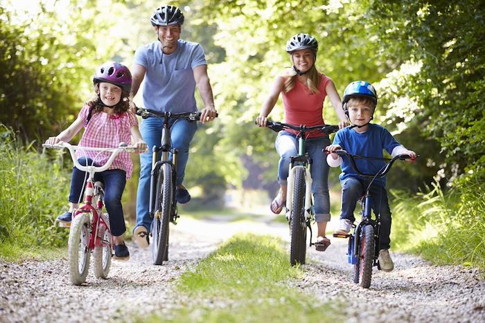 Family On Cycle Ride In Countryside