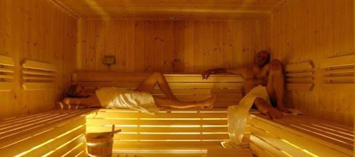 A couple enjoying a sauna