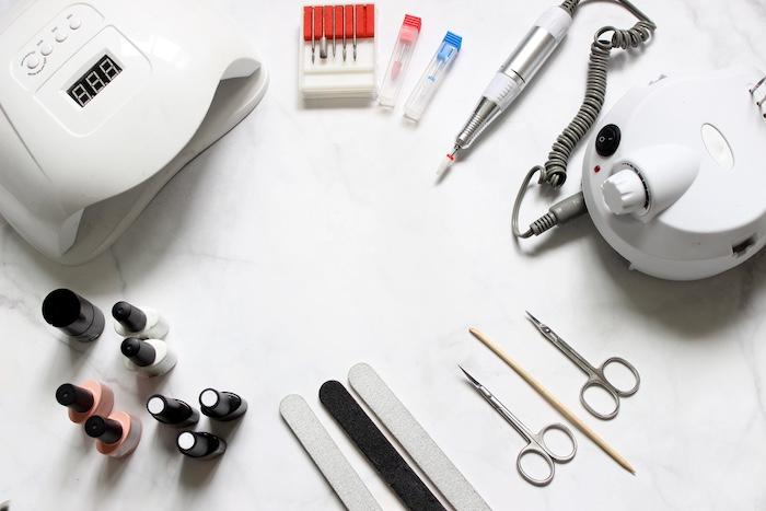 Top view of tools and materials for modern manicure and nail extension.manicure tools