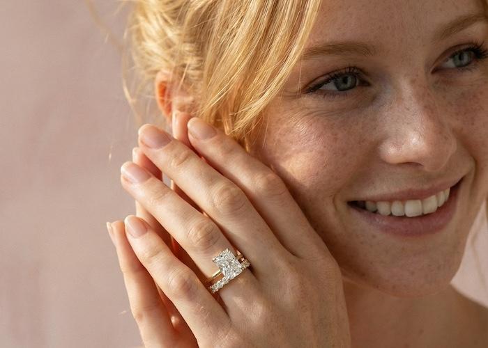 Bezel engagement ring gap beside a wedding band